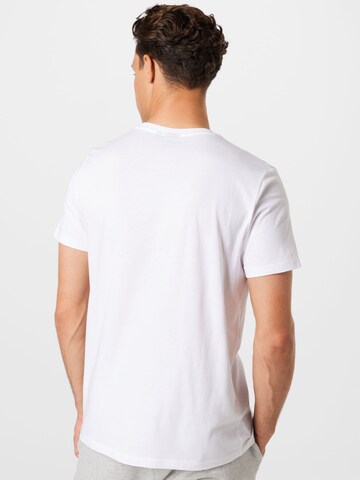 T-Shirt fonctionnel Hummel en blanc