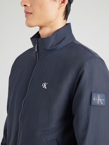 Calvin Klein Jeans Φθινοπωρινό και ανοιξιάτικο μπουφάν 'Harrington' σε μπλε
