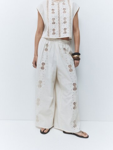 Next - Pierna ancha Pantalón en beige: frente
