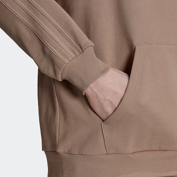 ADIDAS ORIGINALSSweater majica 'Reveal' - smeđa boja