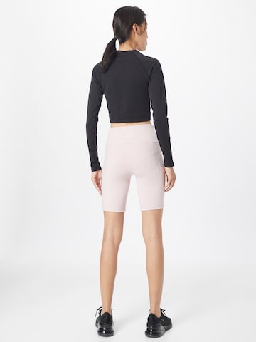UNDER ARMOUR Slimfit Sportovní kalhoty 'Meridian' – pink