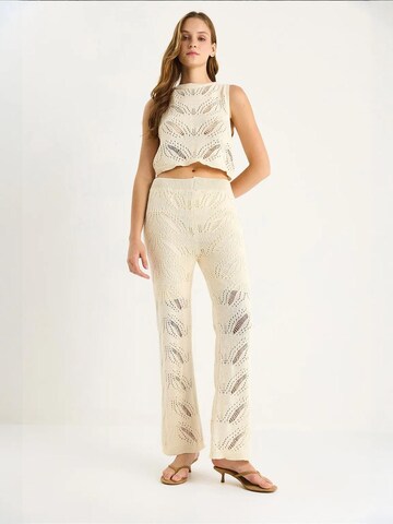 Pantalons de tailleur Bianco Lucci en beige