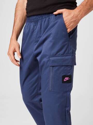 Nike Sportswear Tapered Trousers in Blue