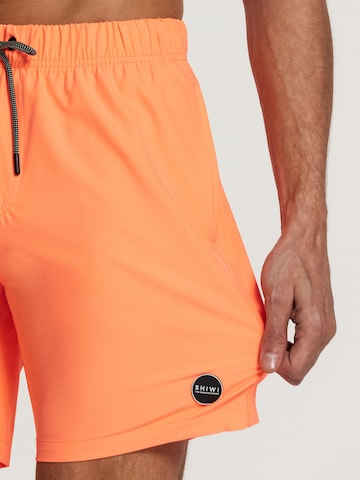 Shiwi Board Shorts 'easy mike solid 4-way stretch' in Orange