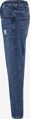 Skinny Jeans di Karl Kani in blu
