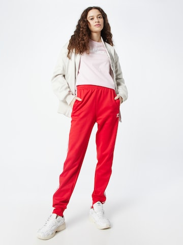 Tapered Pantaloni 'Adicolor Classics Cuffed' di ADIDAS ORIGINALS in rosso
