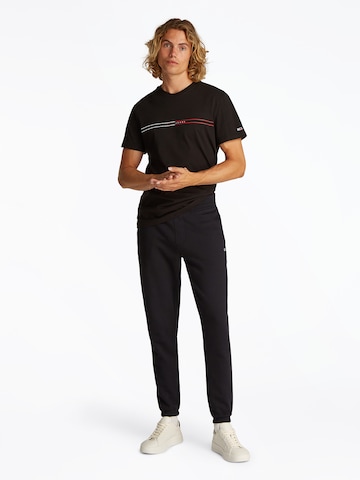 Tapered Pantaloni di Tommy Jeans in nero