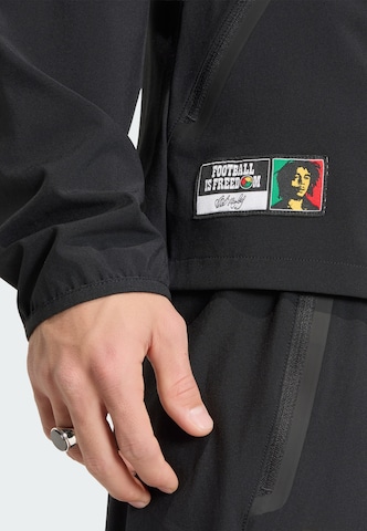 ADIDAS PERFORMANCE Sports jacket 'Jamaika x Bob Marley Tiro Travel' in Black