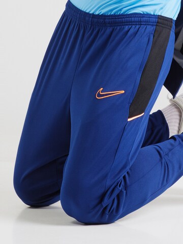 NIKETapered Sportske hlače 'Academy 25' - plava boja
