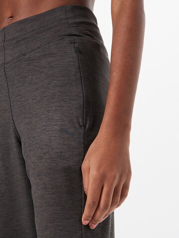 Effilé Pantalon de sport PUMA en noir