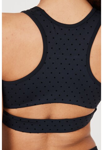 Athlecia Medium Support Sport-BH 'Tiya' in Schwarz