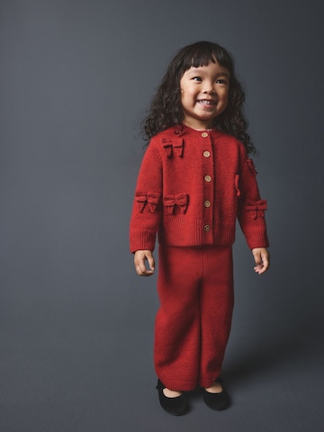 Next - Conjunto en rojo: frente