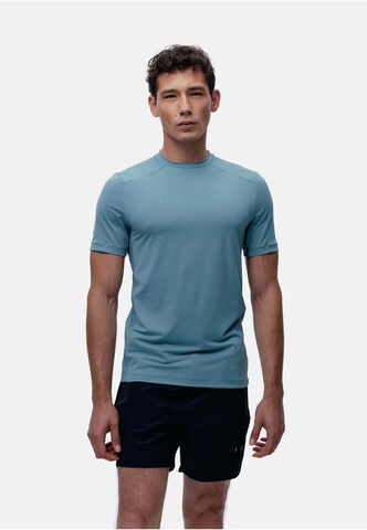 Born Living Yoga Shirt 'Volta' in Blue: front