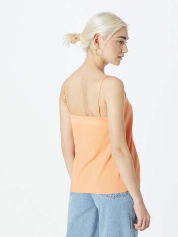 Top di s.Oliver in arancione