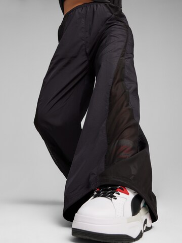 PUMA Szeroka nogawka Spodnie 'DARE TO' w kolorze czarny: przód