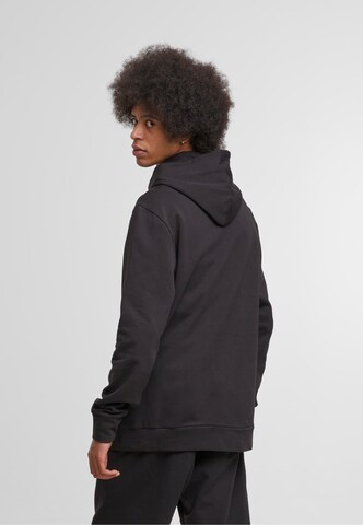 PUMA Bluzka sportowa 'Better Essentials' w kolorze czarny