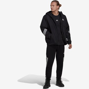 ADIDAS SPORTSWEAR Ulkoilutakki 'Back To ' värissä musta