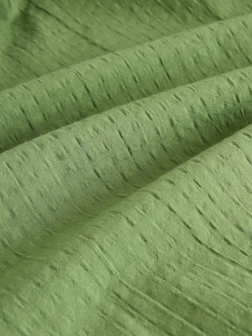 Next Mekko värissä vihreä