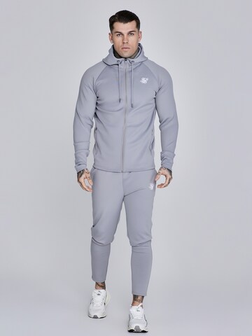 Veste de survêtement 'Poly' SikSilk en gris
