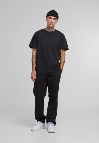 Loosefit Pantaloni chino di Urban Classics in nero