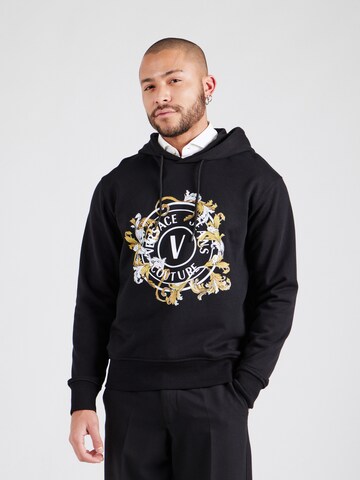 Versace Jeans Couture Μπλούζα φούτερ σε μαύρο: μπροστά
