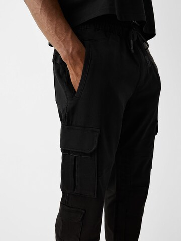 Effilé Pantalon cargo Bershka en noir