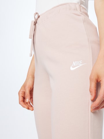 rožinė Nike Sportswear Siaurėjantis Kelnės