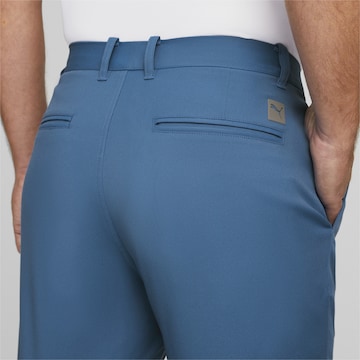PUMA Regular Workout Pants 'Dealer 10"' in Blue