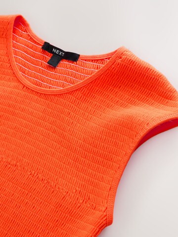 Robe Next en orange