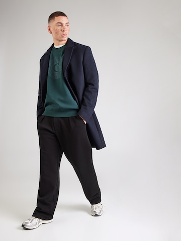 žalia GUESS Megztinis be užsegimo