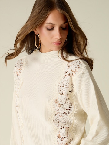 Pullover di oltre in beige