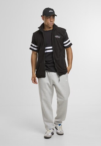 Unfair Athletics Bodywarmer 'Elementary' in Zwart