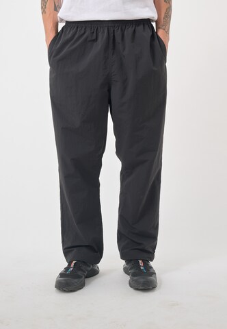 Cleptomanicx Regular Pants in Black: front