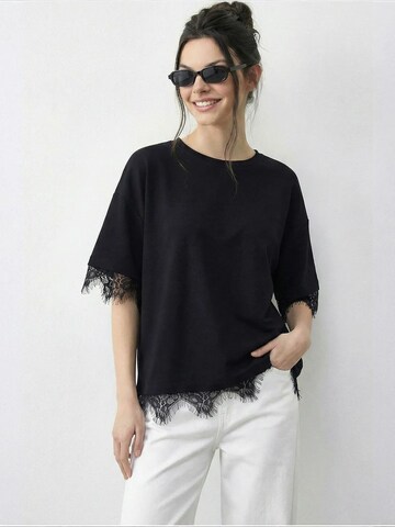 T-shirt 'T-Shirts' Bianco Lucci en noir