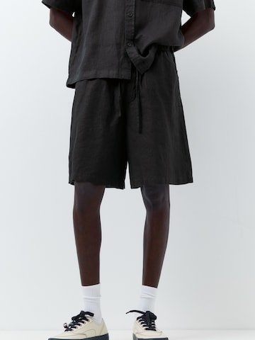 Pull&Bear Bő szár Nadrág - fekete: elől