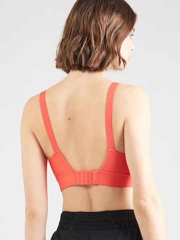 UNDER ARMOUR Korzetová Sportovní podprsenka 'Infinity 2.0' – červená