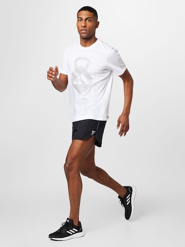 regular Pantaloni sportivi 'Own The Run Split' di ADIDAS PERFORMANCE in nero
