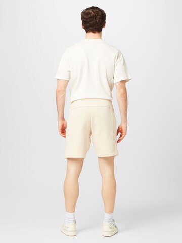 ADIDAS SPORTSWEAR Regular Workout Pants 'City Escape' in Beige