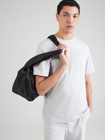 NIKE Funktionsskjorte 'PRIMARY' i grå: forside