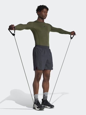 ADIDAS PERFORMANCE - Camisa funcionais em verde: frente