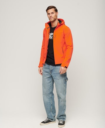 Superdry Outdoorjas in Oranje