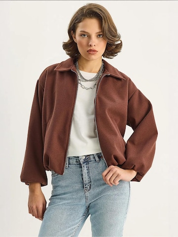 Bianco Lucci Tussenjas in Bruin