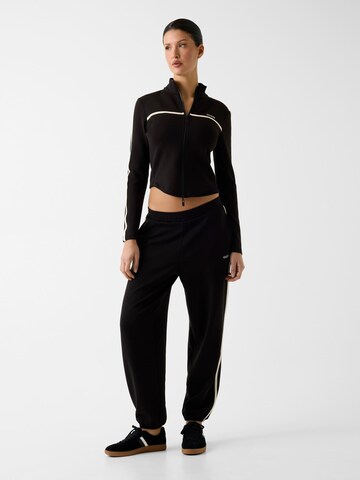 GUESS Sweatjacke in Schwarz