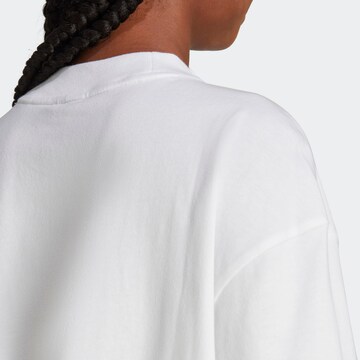 ADIDAS SPORTSWEAR Toiminnallinen paita 'Future Icons Badge Of Sport' värissä valkoinen