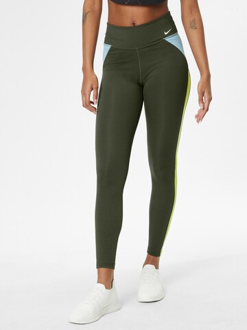 NIKE Skinny Workout Pants in Green: front