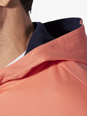 Jan Vanderstorm Sweatshirt 'Korbenkt' in Oranje