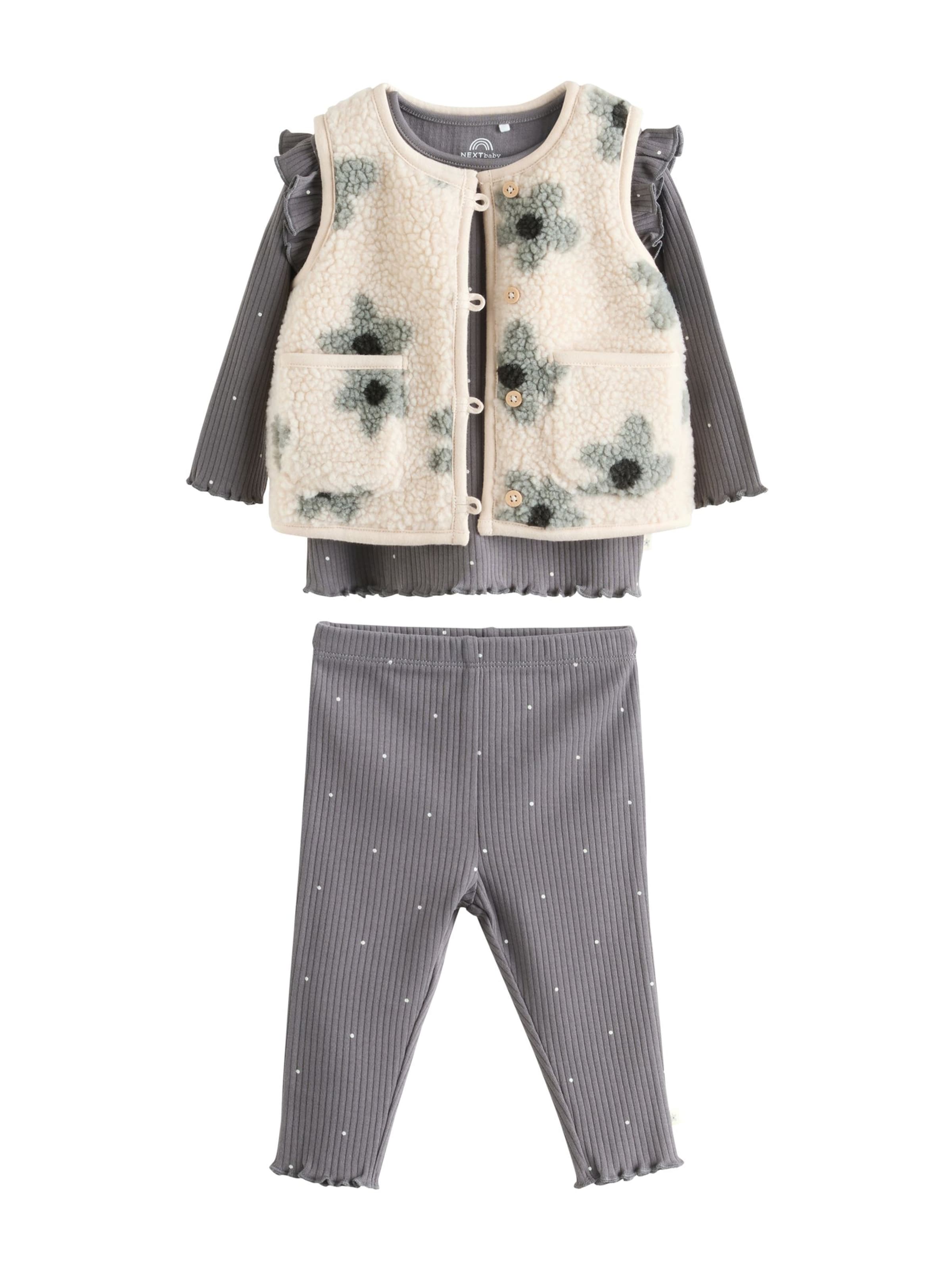 Next Set i grå: framsida