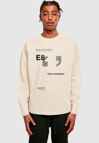 Merchcode Shirt 'APOH - Surreal Hackney Slogan' in Beige: Vorderseite