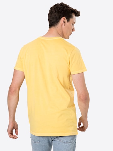 T-Shirt Revolution en jaune
