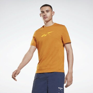 T-Shirt fonctionnel Reebok en orange : devant